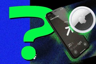 Apple AirTag tracking device with alert notifications on iPhone screen